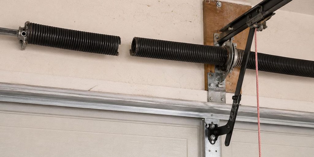 The Complete Guide to Garage Door Springs - Broken torsion garage