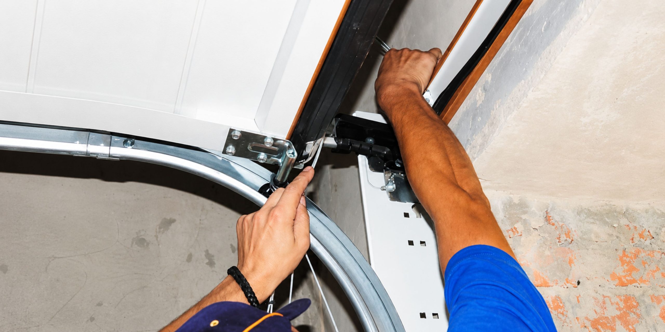 disconnect garage door opener before cable repair