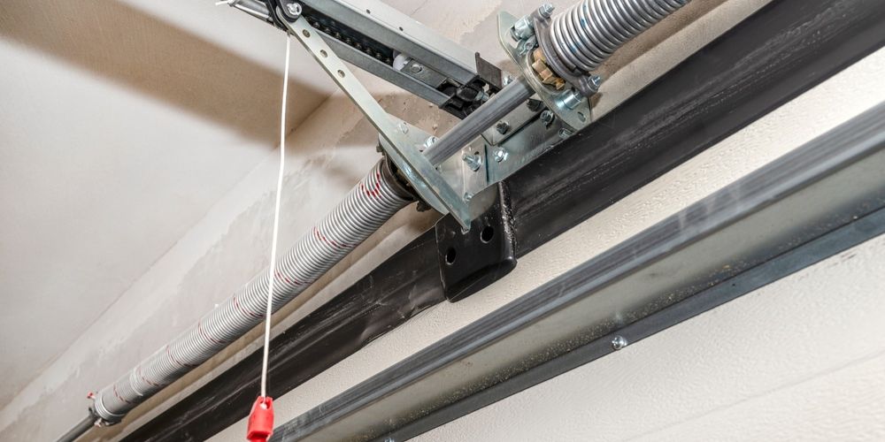 garage door spring replacement warning signs